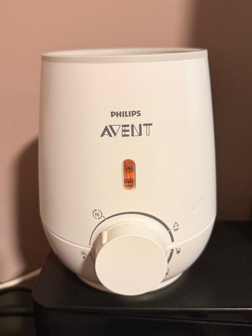 Philips Avent Bottle Warmer (Category: Breastfeeding & Bottle Feeding) located in Singapore. Submitted by treasuresnatch23 (Listing ID 1408057504, Image 2). Description: - Warms bottles and baby food. - Adjustable warming settings. - Simple to use and clean. - In good working condition. - Ideal for busy parents. - Rarely used. *Took photo from different angle & corners. .