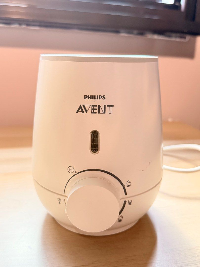 Philips Avent Bottle Warmer (Category: Breastfeeding & Bottle Feeding) located in Singapore. Submitted by treasuresnatch23 (Listing ID 1408057504, Image 1). Description: - Warms bottles and baby food. - Adjustable warming settings. - Simple to use and clean. - In good working condition. - Ideal for busy parents. - Rarely used. *Took photo from different angle & corners. .