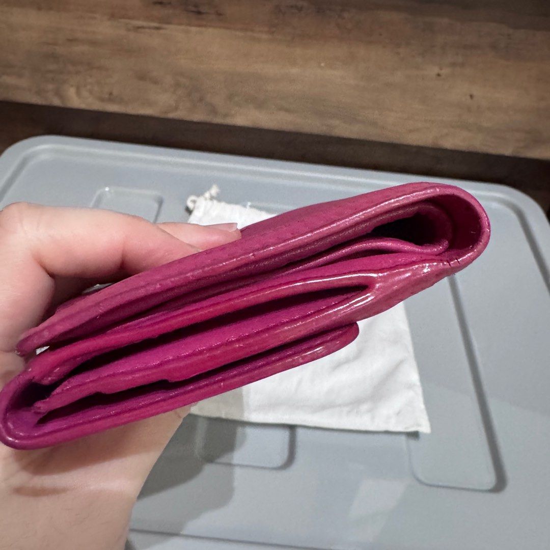 PRELOVED: Prada vitello pink bow wallet (Category: Luxury Bags & Wallets) located in Quezon City. Submitted by shop.spark.joy (Listing ID 1408105502, Image 3). Description: .