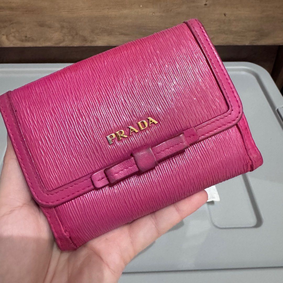 PRELOVED: Prada vitello pink bow wallet (Category: Luxury Bags & Wallets) located in Quezon City. Submitted by shop.spark.joy (Listing ID 1408105502, Image 2). Description: .