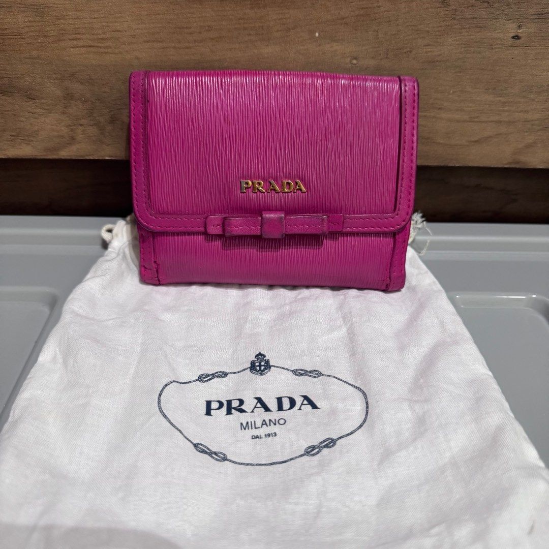 PRELOVED: Prada vitello pink bow wallet (Category: Luxury Bags & Wallets) located in Quezon City. Submitted by shop.spark.joy (Listing ID 1408105502, Image 1). Description: .