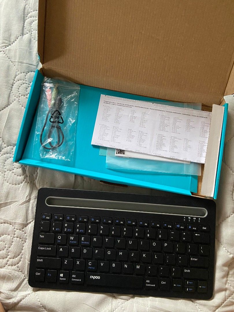 Rapoo XK100 Bluetooth Keyboard (Category: Computer Keyboard) located in Manila. Submitted by chinabone (Listing ID 1408070945, Image 3). Description: Includes original box and manual. Barely used, nakatambak lang. Dm for any inquiries. BT 3.0 Can simultaneously connect to 3 devices and across iOS, Windows, and Android. .