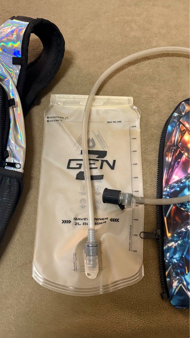 RaveRunner Hydration Backpack - Hologram (used once) (Category: Backpacks) located in Pasig City. Submitted by danuelv (Listing ID 1408077351, Image 3). Description: Used once for EDC Phuket 2025 — still in very good condition. Cleaned and sanitised already. With free Rainbow skin. Great for festivals, hikes, runs, and travels. Comes with hydration pocket/bladder slot, anti-theft zip design, lightweight and comfy to wear. Selling because I won’t 