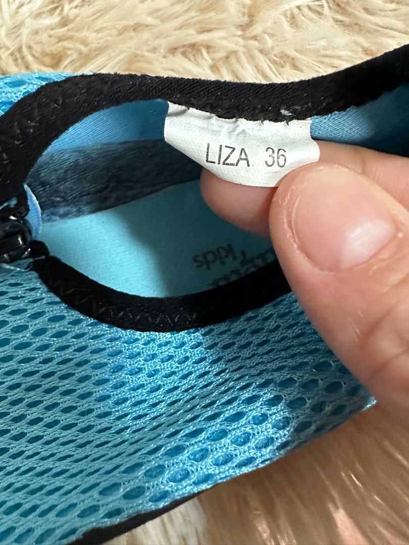 Sugar Kids Water Shoes - Size 36 (Category: Babies & Kids Fashion) located in Cainta. Submitted by kath_pl (Listing ID 1407951749, Image 2). Description: - Sugar Kids water shoes - Light blue color - Size 36 - Zipper closure - Black trim - Ideal for water activities and beach trips.
