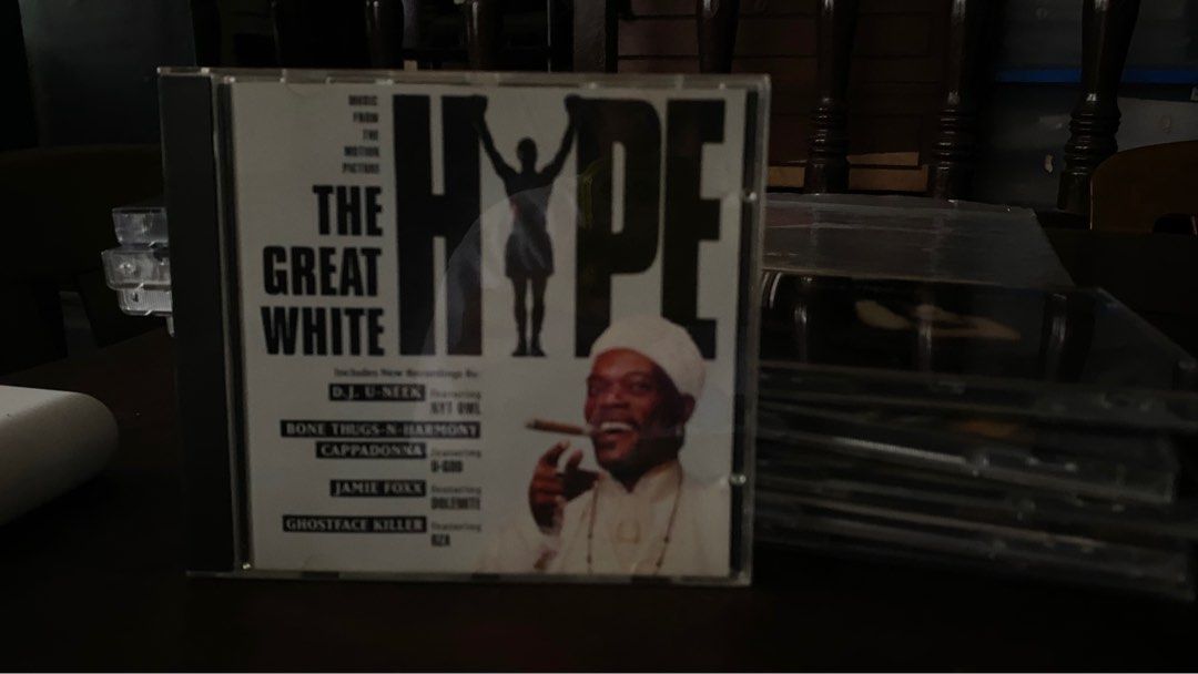 The Great White Hype Soundtrack CD (Category: CDs & DVDs) located in Tabaco. Submitted by cinemahilig (Listing ID 1407990723, Image 1). Description: - Original soundtrack CD for "The Great White Hype" - Features music from artists like D.J. U-Neek, Bone Thugs-N-Harmony, and Ghostface Killah - Includes tracks: - "Money, Hoes & Prospects" - "Ballin's & Boozin'" - "We Got It".