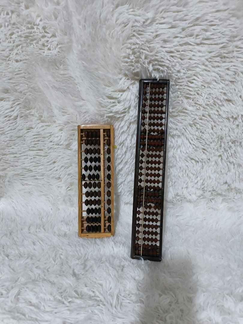 Vintage Abacus Set (Category: Educational & Learning Toys) located in Marikina City. Submitted by andreah_16 (Listing ID 1407960632, Image 3). Description: - Two abacuses available! 2 for 150 - One is wooden with dark beads. - The other is a darker color with a unique bead design. - Great for learning math or as a decorative item..