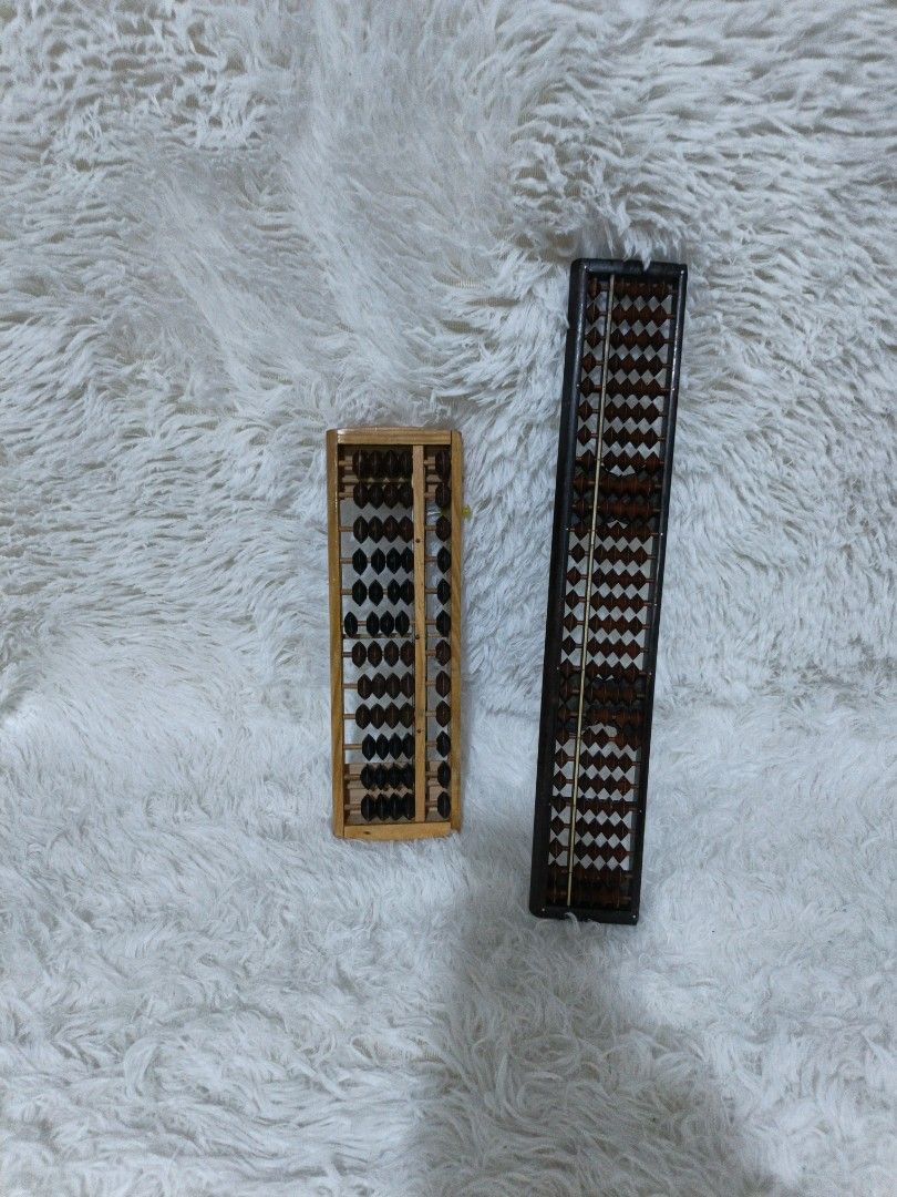 Vintage Abacus Set (Category: Educational & Learning Toys) located in Marikina City. Submitted by andreah_16 (Listing ID 1407960632, Image 2). Description: - Two abacuses available! 2 for 150 - One is wooden with dark beads. - The other is a darker color with a unique bead design. - Great for learning math or as a decorative item..