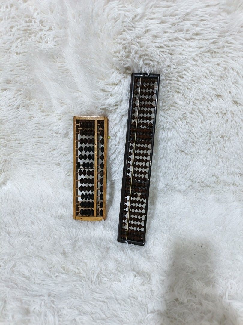 Vintage Abacus Set (Category: Educational & Learning Toys) located in Marikina City. Submitted by andreah_16 (Listing ID 1407960632, Image 1). Description: - Two abacuses available! 2 for 150 - One is wooden with dark beads. - The other is a darker color with a unique bead design. - Great for learning math or as a decorative item..