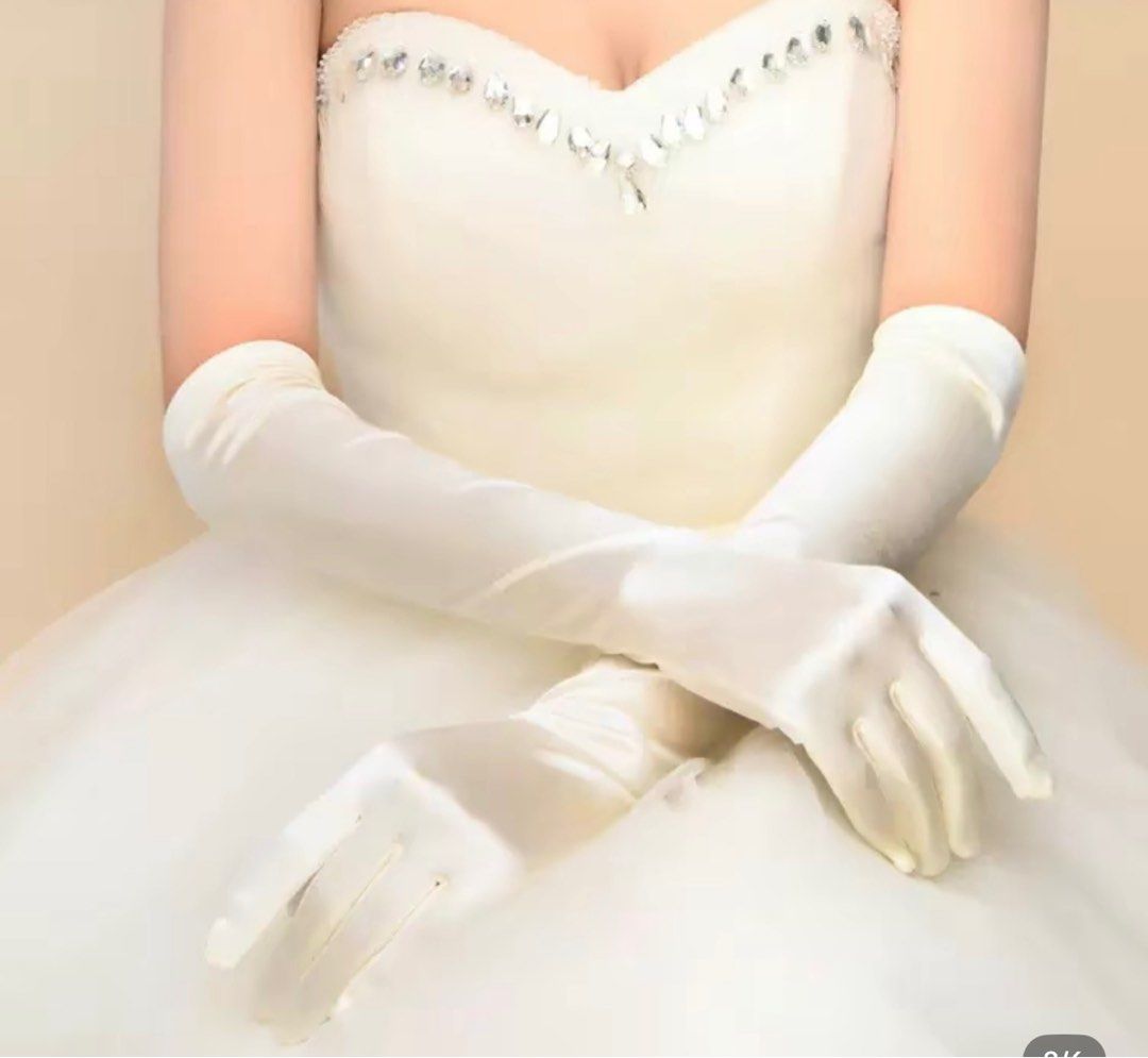 White Satin Long Gloves (Category: Gloves) located in Rizal. Submitted by preluvjay (Listing ID 1408030926, Image 2). Description: - Only used once - Elegant white satin gloves, perfect for weddings, formal events, or costumes. - Past the elbow - Made of a smooth, shiny satin material. - Ideal for completing a bridal look or adding a touch of sophistication to any outfit..