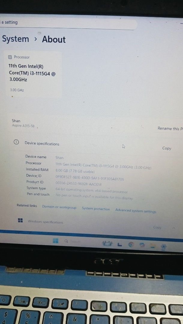 Acer Laptop i3-1115G4 (Category: Laptops & Notebooks) located in Quezon City. Submitted by sunnyshan1234 (Listing ID 1408242396, Image 2). Description: - Acer laptop with custom blue and pink skin - Intel Core i3-1115G4 processor - 8GB RAM - Includes a USB port - Screen displays system information.