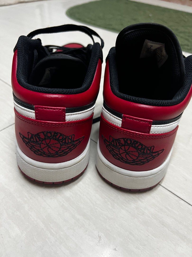 Air Jordan 1 Low Alternate Bred Toe (Category: Sneakers) located in Manila. Submitted by kingofthegil (Listing ID 1408255995, Image 3). Description: - Air Jordan 1 Low sneakers - Color: Black and red - Features the iconic Air Jordan logo - Size: 9 - Made in Vietnam - White midsole and black laces.