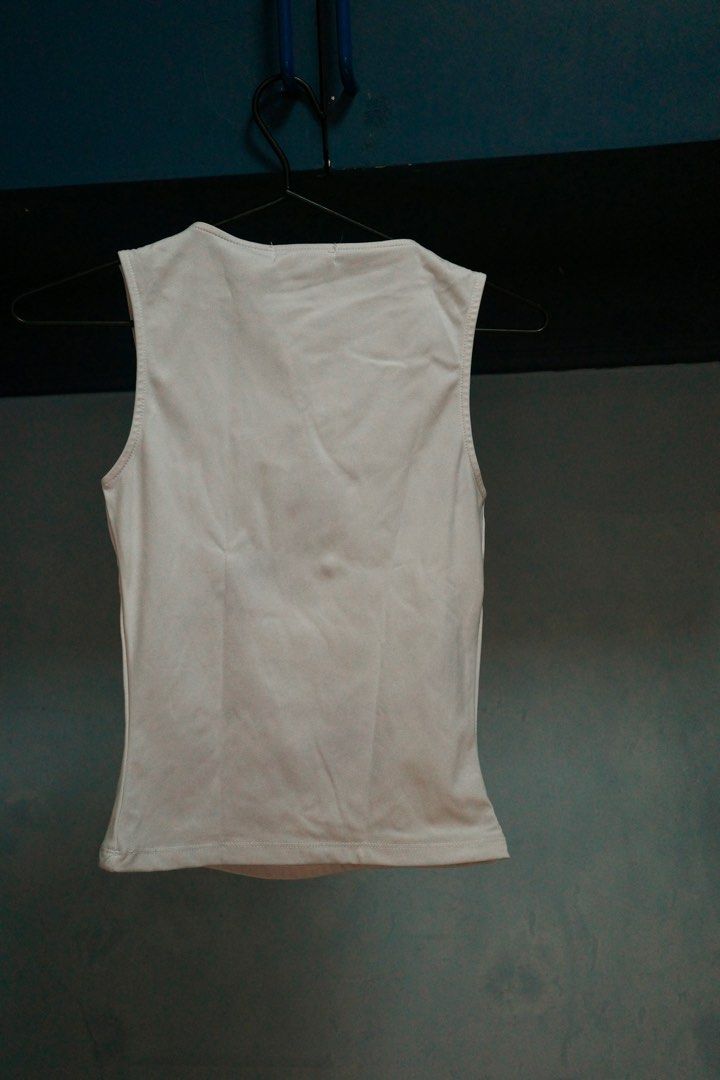 Augety Studio White Tank Top - Size S (Category: Sleeveless) located in Quezon City. Submitted by kitkat0328 (Listing ID 1408183549, Image 3). Description: - Augety Studio Tank Top - Size: Small - Color: White - Design: Square neckline, sleeveless - Material: Soft buttery fabric.