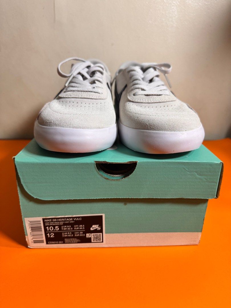 [AUTHENTIC | NEW] Nike SB Heritage Vulc Sneakers (Category: Sneakers) located in Makati City. Submitted by abstanding (Listing ID 1408290363, Image 2). Description: [AUTHENTIC | NEW] Nike SB Heritage Vulc Sneakers - Brand new - Mens (US10.5 / UK9.5 / EUR44.5) - Color: VAST GREY / IRON GREY / GRIS INFINI / GRIS FER - Swoosh: Dark grey - Midsole/Outsole: White - Includes original box - Perfect for casual wear.