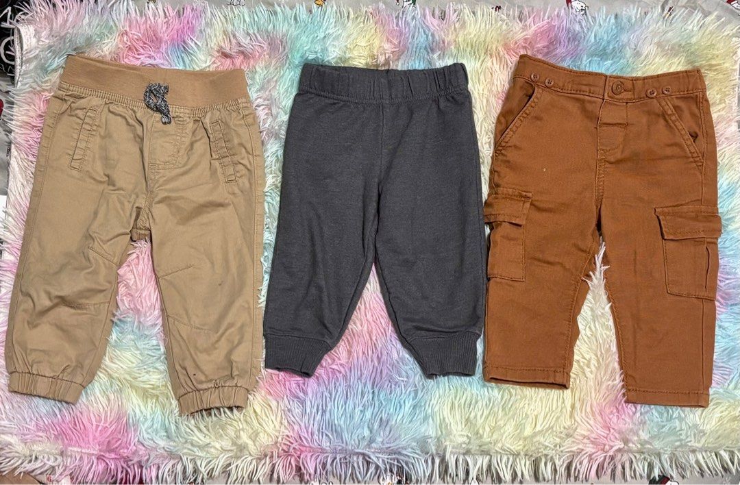 Baby Boy Pants Set (Category: Babies & Kids Fashion) located in Pasay City. Submitted by sandybuggy (Listing ID 1408250549, Image 1). Description: For take all Khaki pants 6-9mos Jogger- 9mos cargo pants-9mos All branded.