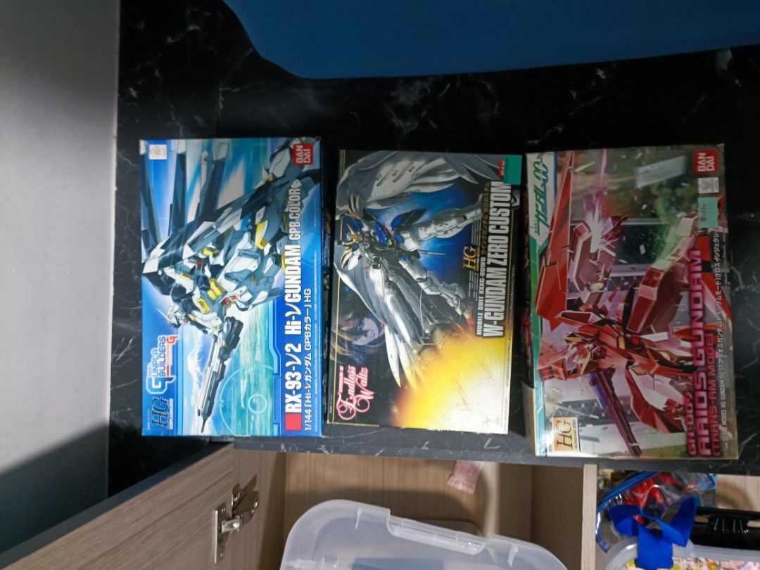 Bandai HG Gunpla Models (Built) - Hi-v Gundam, Wing Zero, and Arios (Category: Gundam Model Kits) located in Singapore. Submitted by kh1099 (Listing ID 1408191867, Image 1). Description: Selling three Bandai HG Gunpla Models (Built) Includes RX-93-v2 -v Gundam, W-Gundam Zero Custom, and Arios Gundam. All have been built. DM for individual pricing. $60 for all..