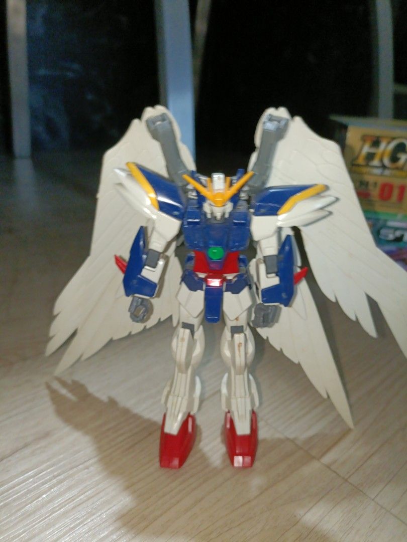 Bandai HG Gunpla Models (Built) - Hi-v Gundam, Wing Zero, and Arios (Category: Gundam Model Kits) located in Singapore. Submitted by kh1099 (Listing ID 1408191867, Image 2). Description: Selling three Bandai HG Gunpla Models (Built) Includes RX-93-v2 -v Gundam, W-Gundam Zero Custom, and Arios Gundam. All have been built. DM for individual pricing. $60 for all..