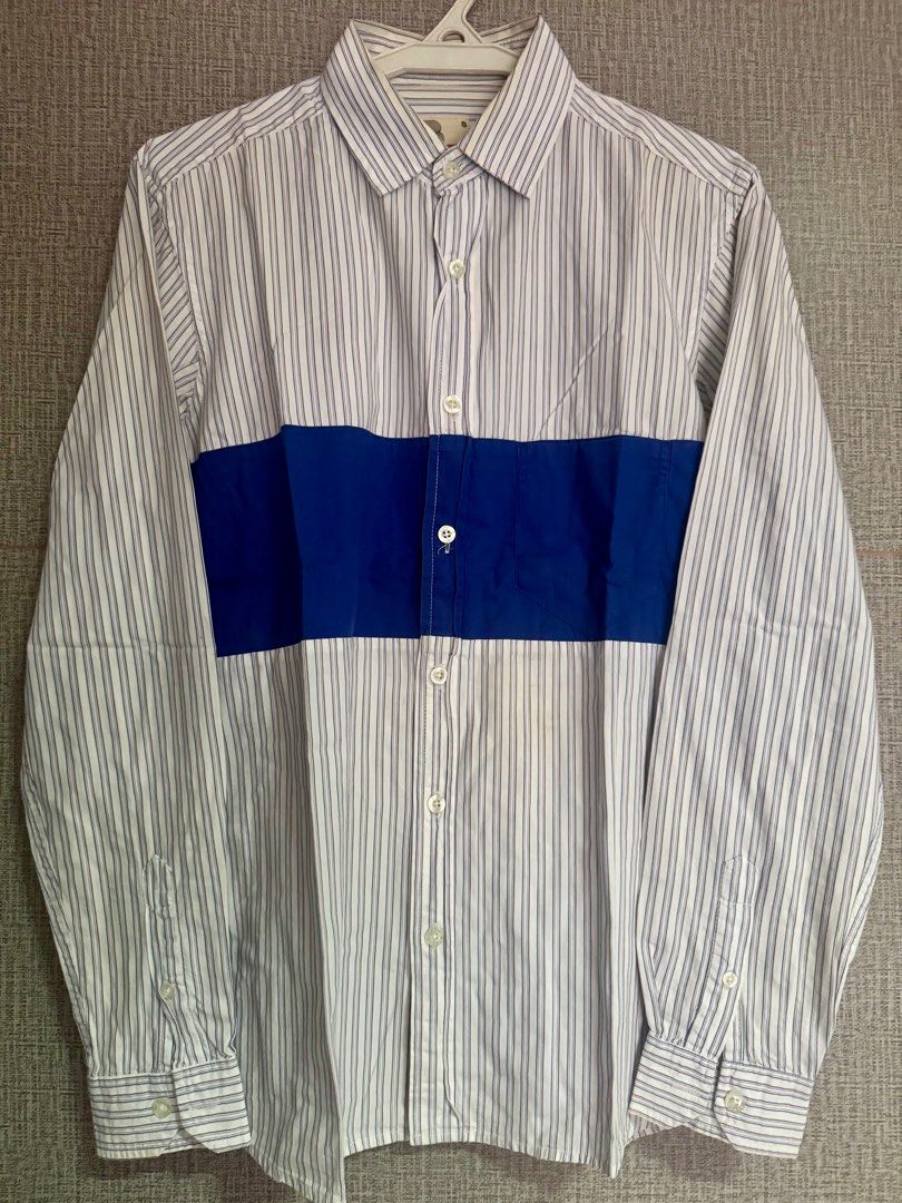 Bench Striped Shirt with Blue Accent (Category: Tshirts & Polo Shirts ) located in Antipolo. Submitted by prelovedbyjerry (Listing ID 1408151628, Image 1). Description: Bench Button Down Shirt Long Sleeves Polo Condition: Used Color: White Stripe with Blue accent Size: Small (W:19 L:27) Mode of Payment: Gcash Delivery: via courier paid by the buyer.