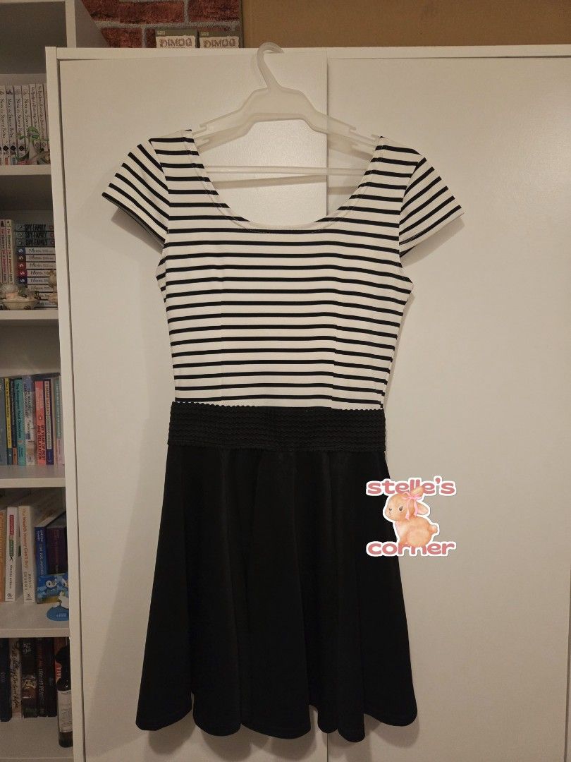 Black & White Mini Dress with Cap Sleeves (Category: Dresses) located in Quezon City. Submitted by stelles.corner (Listing ID 1408238174, Image 3). Description: Black & White Mini Dress with Cap Sleeves - Php 150 Thick fabric ✨️ Brand: Local Shop Size: S to M Issues: none 📍Location: Quezon City, Metro Manila 💳 Mode of Payment (MOP): Bank Transfer or GCash (payment first basis) 🚚 Mode of Delivery (MOD): Lalamove, GrabExpress (Same Day Delivery)