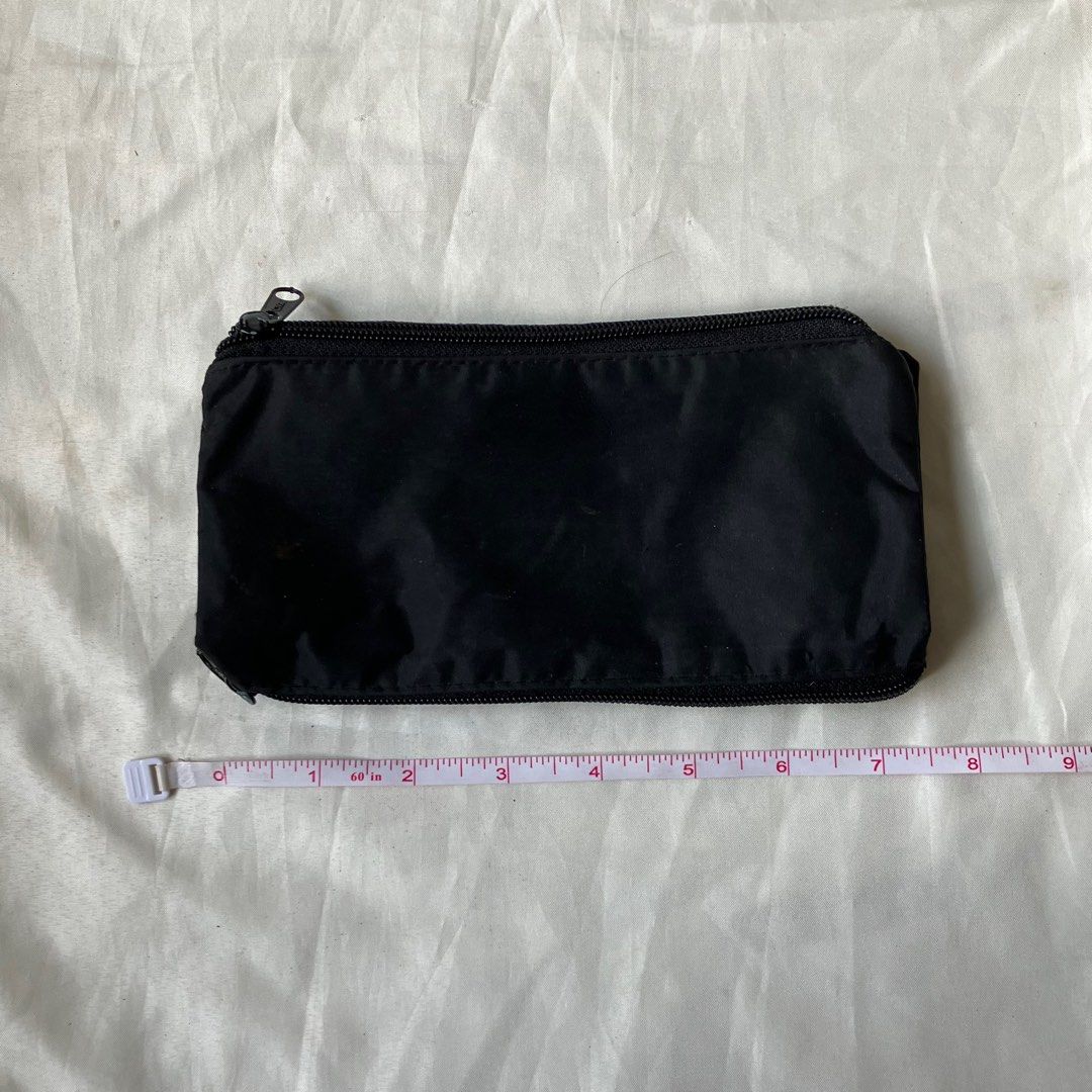 black multiple compartment pencil case pouch (Category: Cases & Sleeves) located in Quezon City. Submitted by namu_milkyway (Listing ID 1408125315, Image 1). Description: Condition: 8/10 (no damage just signs of use) MOP: Gcash MOD: J&T / Same day delivery (from Roxas District, Quezon City).