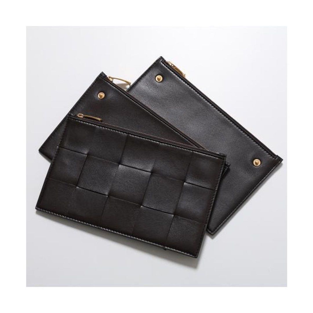 Bottega Veneta Woven Clutch (Category: Luxury Bags & Wallets) located in Taguig. Submitted by sourcedbym (Listing ID 1408170241, Image 2). Description: - Bottega Veneta clutch - Woven design - Dark brown color - Zip closure with gold-tone zipper - Branded interior - Versatile for various occasions #bottega #bottegaveneta.