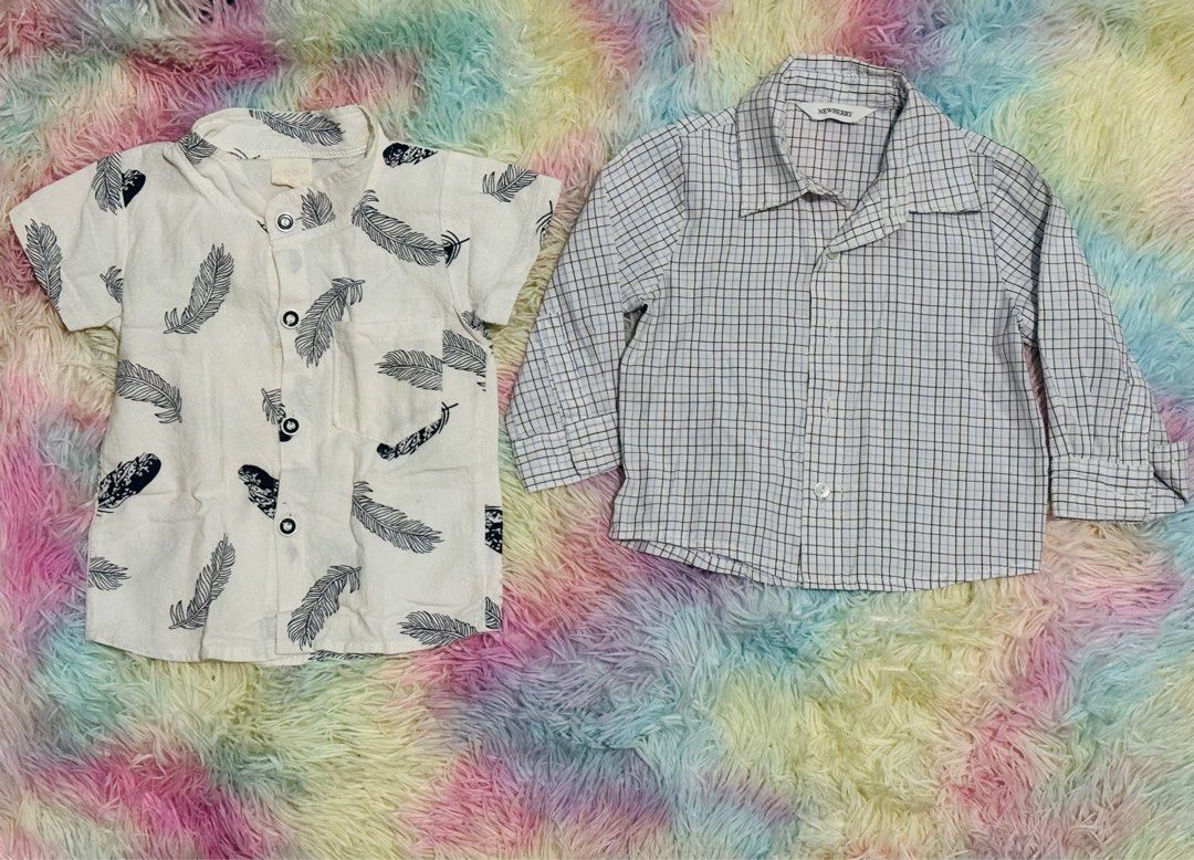 Boy polo (Category: Babies & Kids Fashion) located in Pasay City. Submitted by sandybuggy (Listing ID 1408263449, Image 1). Description: - Two kids' shirts available! - Shirt 1: Short-sleeved, white base with black feather print, button closure. - Shirt 2: Long-sleeved checkered shirt with collar, button closure. - Both shirts made of lightweight fabric..