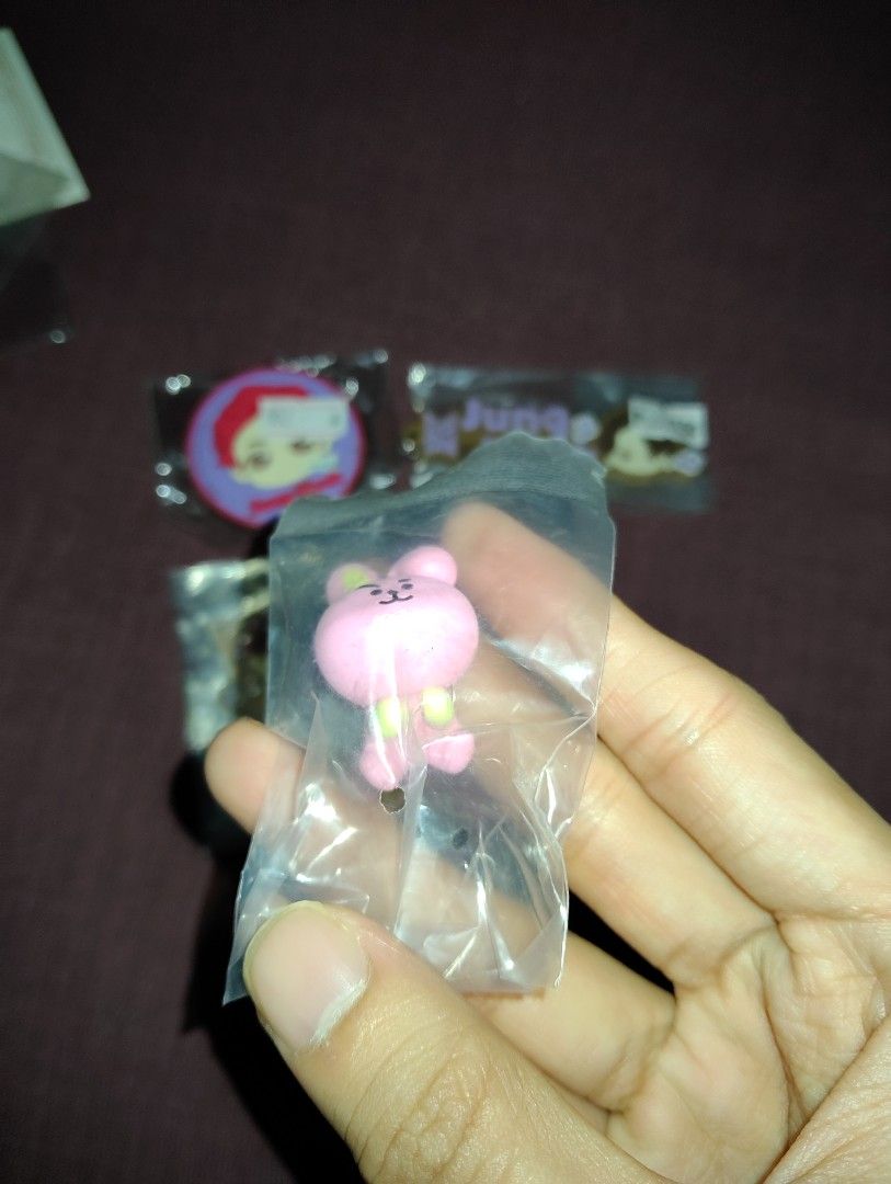 BTS Jungkook Merch Bundle popsocket acrylic standee cooky hugcot (Category: K-Wave Merchandise) located in Pasig City. Submitted by hazelscollectibles (Listing ID 1408276855, Image 3). Description: - BTS Jungkook merchandise bundle - Includes: popsocket keychain, acrylic standee, and Cooky figurine - All items in original packaging - Perfect for BTS fans and collectors - Prices indicated on items take all.