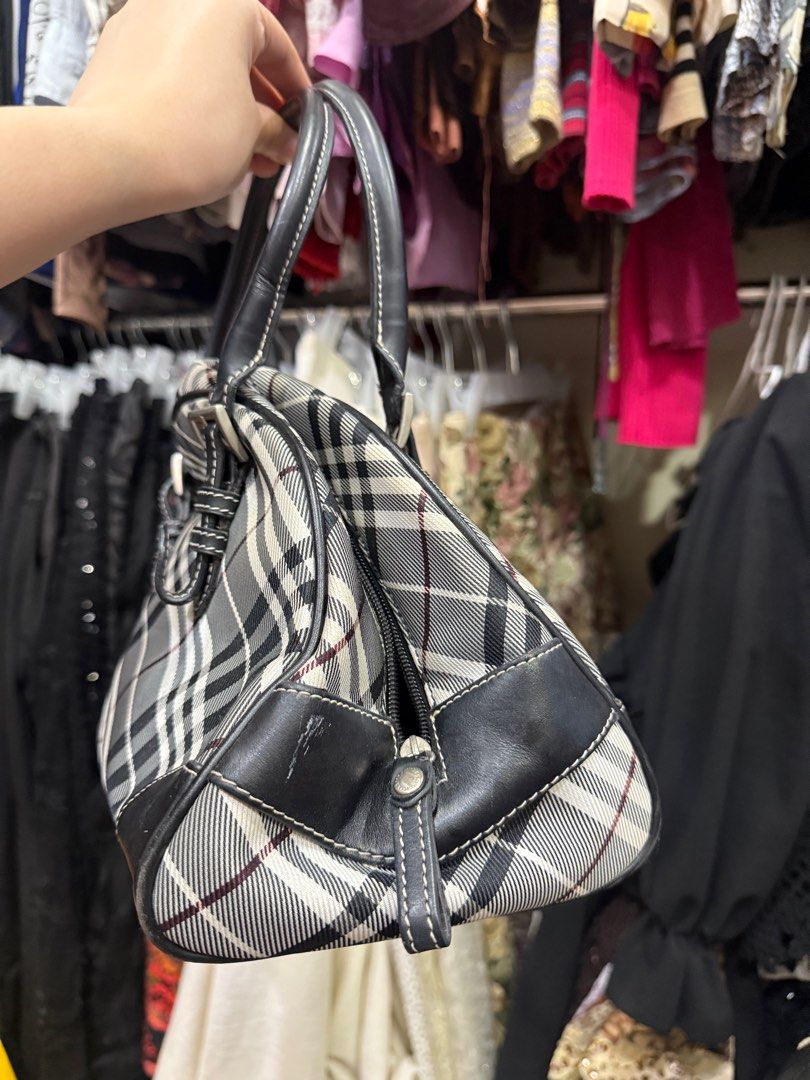 Burberry Blue Label Hand Bag (Category: Luxury Bags & Wallets) located in Manila. Submitted by shopidyllic.ph (Listing ID 1408279537, Image 3). Description: Well used bag -Issues: have Leather scratches each corners and stains. -no issues inside, clean -deformed just need fillers. Not really big issue Mode shipping: flash Mode payment: cash G Second shop at IG; @mylittlebearsncuddles.ph No returns and refunds. Second hand item .