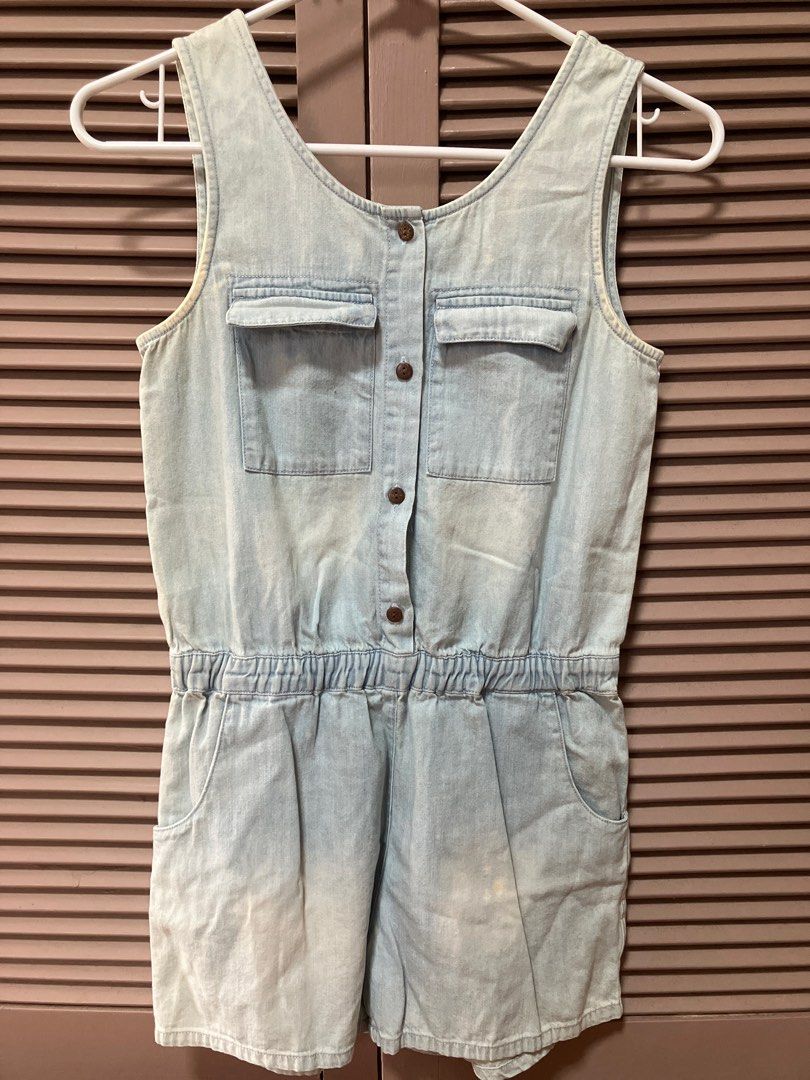 Denim Romper (Category: Babies & Kids Fashion) located in Binan City. Submitted by mrsjca (Listing ID 1408169846, Image 1). Description: - Light blue faded denim romper - Scoop back design - Button-down front closure - Elastic waistband - Two chest pockets - Two front pockets - Sleeveless - Relaxed fit.
