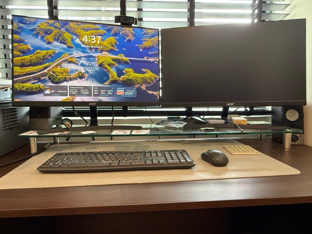 Desk Riser (Category: Home Improvement Tools & Accessories) located in Singapore. Submitted by poodeepop (Listing ID 1408198827, Image 1). Description: Glass desk riser, legs with adjustable height. Photo is representative - shows my current desk. I have a second set that is in storage that was used for less than a year..