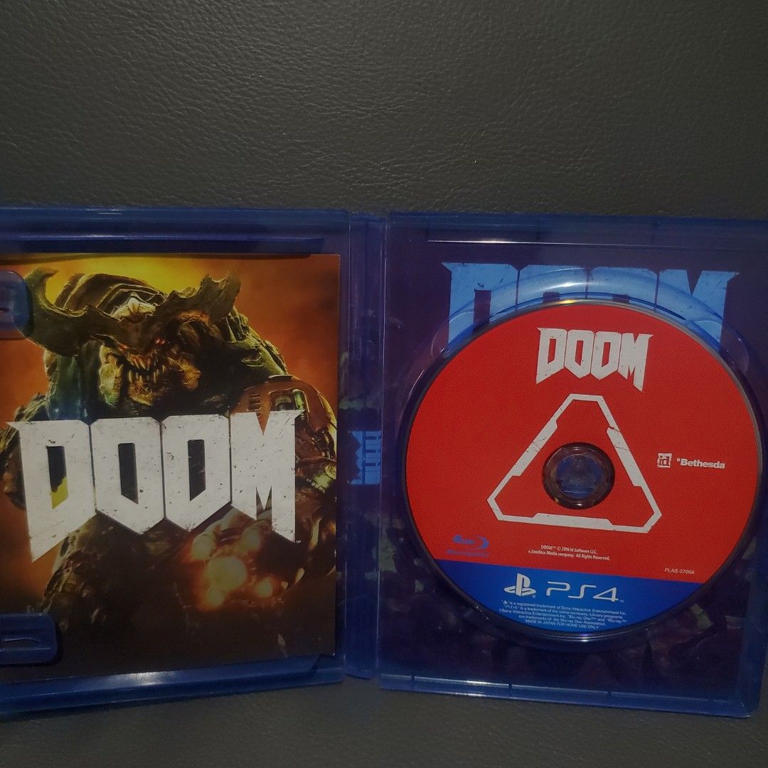Doom PS4 Game (Category: PlayStation) located in Manila. Submitted by seb1stia943546 (Listing ID 1408236057, Image 3). Description: - Doom for PlayStation 4 - Includes game disc and case - Rated M for Mature - Features screenshots on the back of the case - Published by Bethesda - For home use only.