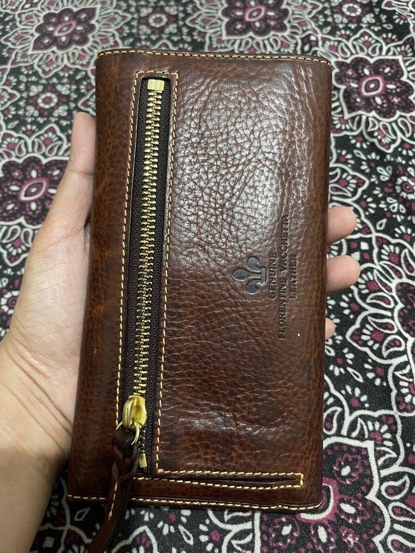 Dooney and Bourke Trifold Long Wallet (Category: Luxury Bags & Wallets) located in Quezon City. Submitted by minekoh21 (Listing ID 1408280968, Image 2). Description: - Authentic Dooney & Bourke - Premium leather exterior with classic stitching - Trifold long design for generous storage - Multiple card slots, slip pockets, and full-length bill compartment with extra check - Removable checkbook pocket for added versatility - Secure snap closure - S