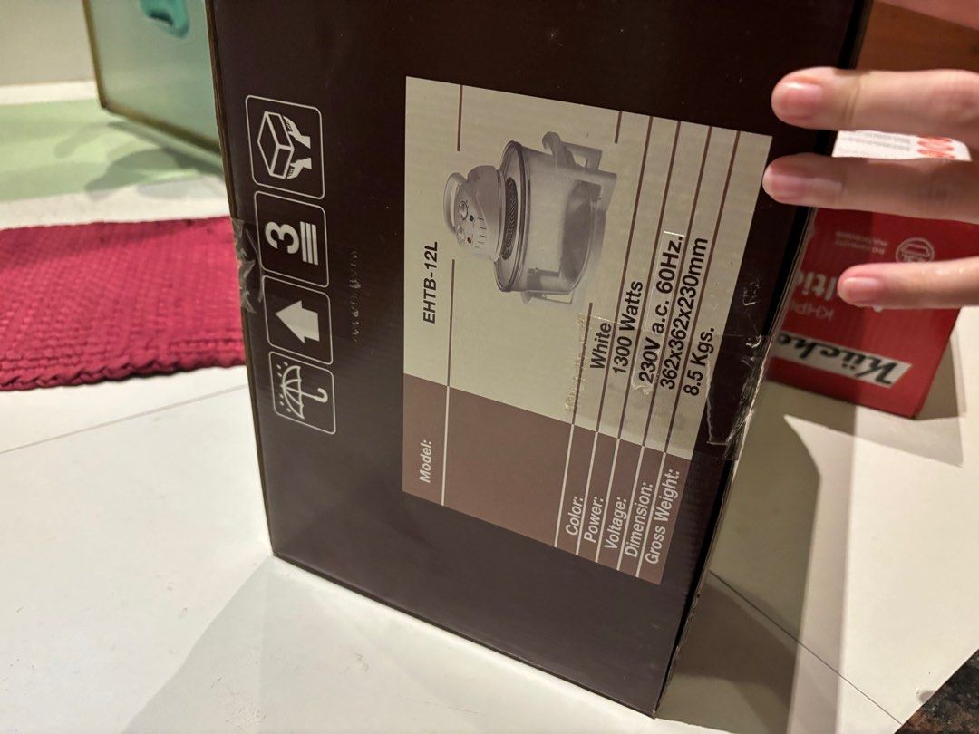 Eureka EHTB-12L Turbo Broiler (Category: Cookware & Accessories) located in Manila. Submitted by pepper7779 (Listing ID 1408223788, Image 3). Description: Eureka EHTB-12L Turbo Broiler with 12 liters capacity. It can cook a variety of foods like brochettes, chicken, steak, fish, vegetables, French fries, and potatoes. Features adjustable thermostat from 60 to 250 degrees Celsius and a timer up to 60 minutes. The bowl and accessories are dishwashe