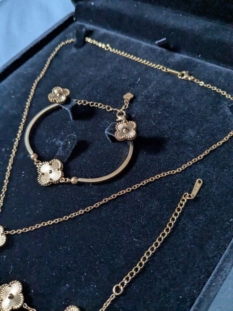 Full Gold Tone Arpels Alhambra Clover Accessories Set (Category: Necklaces) located in Quezon City. Submitted by nnncorner (Listing ID 1408254314, Image 3). Description: Full Gold Tone Arpels Alhambra Clover Accessories Set 4 in 1 Necklace Length - 24 cm (locked) Bracelet 1 fits 17-23 cm wrist Bangle Bracelet 2 17-19 cm wrist Earrings 1/2 inch Hypoallergenic Non tarnished Stainless Steel engraved on lock Super pretty in person It comes with hard 