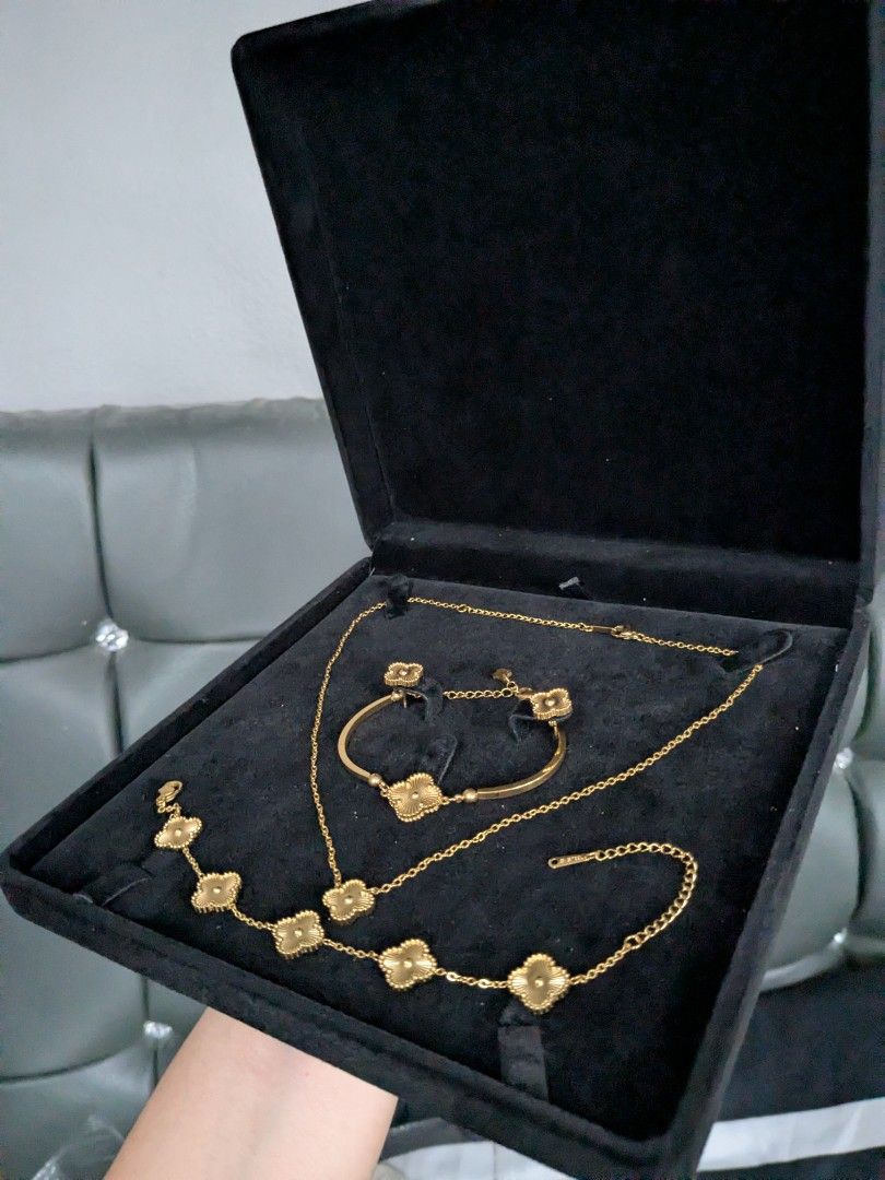 Full Gold Tone Arpels Alhambra Clover Accessories Set (Category: Necklaces) located in Quezon City. Submitted by nnncorner (Listing ID 1408254314, Image 2). Description: Full Gold Tone Arpels Alhambra Clover Accessories Set 4 in 1 Necklace Length - 24 cm (locked) Bracelet 1 fits 17-23 cm wrist Bangle Bracelet 2 17-19 cm wrist Earrings 1/2 inch Hypoallergenic Non tarnished Stainless Steel engraved on lock Super pretty in person It comes with hard 