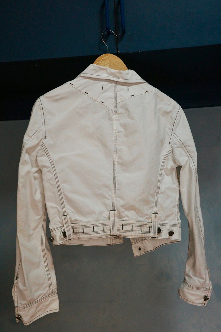 J. Lindeberg Denim White Jacket (Category: Coats, Jackets and Outerwear) located in Quezon City. Submitted by kitkat0328 (Listing ID 1408181695, Image 3). Description: - J. Lindeberg white denim jacket - Button closures - Two chest pockets - Classic collar - Black stitching details - Tailored back design - Condition: Visible stains present.