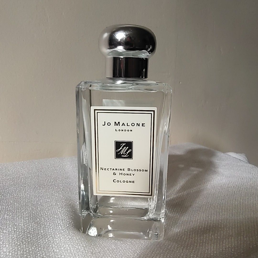 Jo Malone Nectarine Blossom & Honey Cologne 100ml (Category: Fragrance & Deodorants) located in Binan City. Submitted by apparelsbyeve (Listing ID 1408286308, Image 2). Description: - Tester Jo Malone Nectarine Blossom & Honey Cologne - 100ml bottle - Includes box - Features silver cap and clear glass bottle.