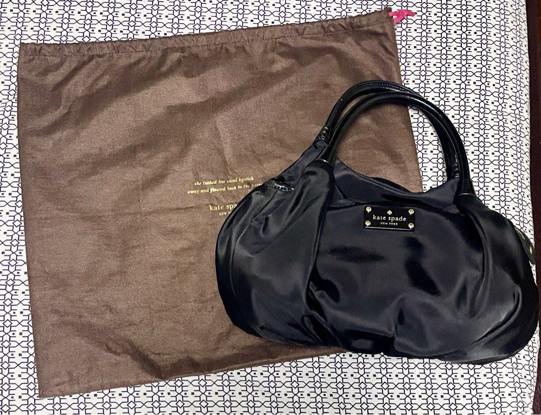 Kate Spade Nylon bag (Category: Luxury Bags & Wallets) located in Makati City. Submitted by yhannie23 (Listing ID 1408182622, Image 2). Description: Almost new Well kept Used twice only Pwede sa maselan Super gaan Dust bag and care cards included Shipping fee will be shouldered by the buyer..