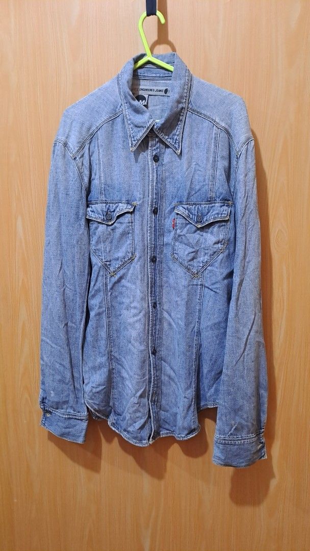 Levi's Engineered Jeans Denim Jacket (Category: Coats, Jackets and Outerwear) located in Las Pinas. Submitted by beng2024 (Listing ID 1408158569, Image 1). Description: - Levi's Engineered Jeans denim jacket - Size: M - Color: Light blue wash, very soft material - Features: Two chest pockets, button closures - Condition: Minor wear on sleeves - Made in Turkey dimensions: shoulder to shoulder 19" armpit to armpit 20" sleeves 27" length 31" .