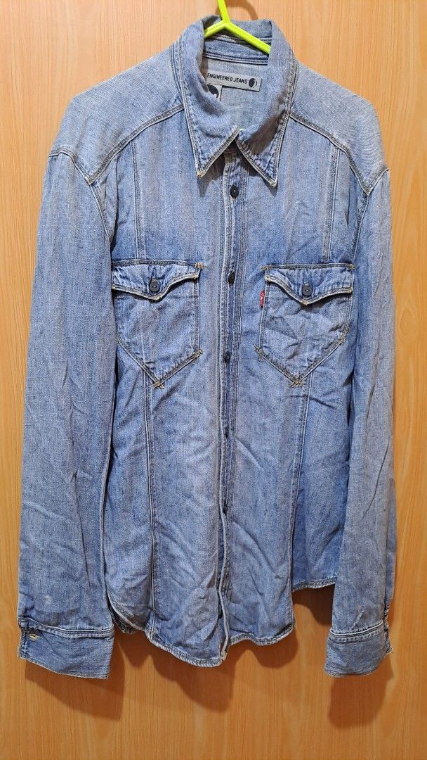 Levi's Engineered Jeans Denim Jacket (Category: Coats, Jackets and Outerwear) located in Las Pinas. Submitted by beng2024 (Listing ID 1408158569, Image 2). Description: - Levi's Engineered Jeans denim jacket - Size: M - Color: Light blue wash, very soft material - Features: Two chest pockets, button closures - Condition: Minor wear on sleeves - Made in Turkey dimensions: shoulder to shoulder 19" armpit to armpit 20" sleeves 27" length 31" .
