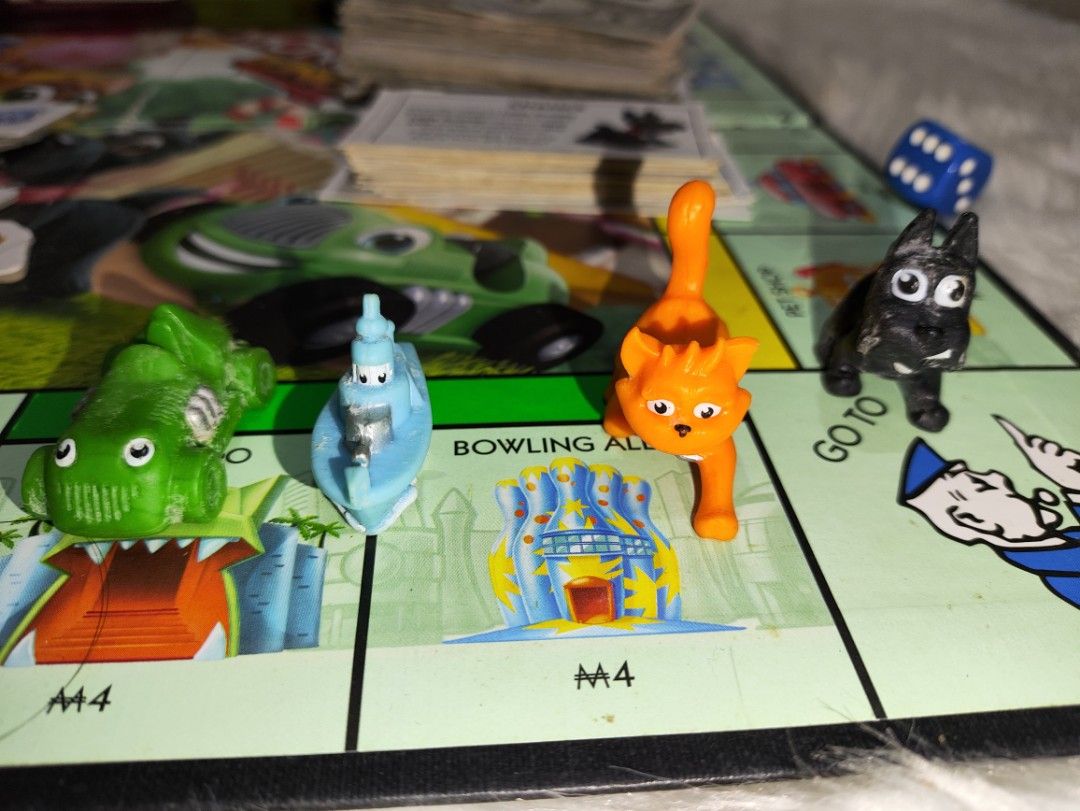 Monopoly Junior Board Game (Category: Board Games & Puzzles) located in Cavite. Submitted by tinetaclesss (Listing ID 1408175194, Image 2). Description: - Monopoly Junior board game. - Includes game board, game pieces, money, chance cards, and property cards. - Complete set. - Box shows some wear. - Great for introducing kids to Monopoly!.