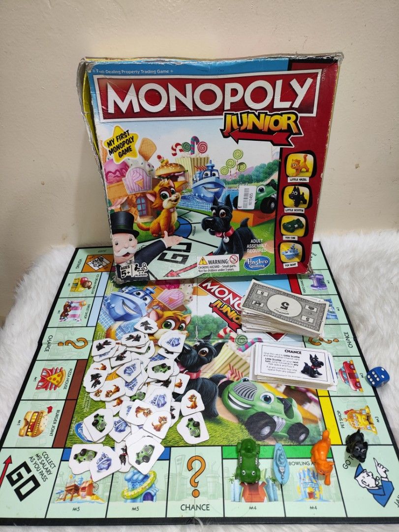 Monopoly Junior Board Game (Category: Board Games & Puzzles) located in Cavite. Submitted by tinetaclesss (Listing ID 1408175194, Image 1). Description: - Monopoly Junior board game. - Includes game board, game pieces, money, chance cards, and property cards. - Complete set. - Box shows some wear. - Great for introducing kids to Monopoly!.