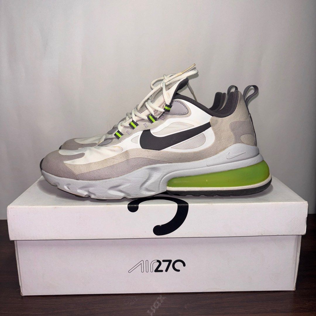 Nike Air Max 270 React (Category: Sneakers) located in Las Pinas. Submitted by mariajuliacq (Listing ID 1408210231, Image 3). Description: - Nike Air Max 270 React sneakers - Size: US 10 - Colorway: White, Grey, Neon Green - Includes original box - Condition: Slight sole separation and discoloration/yellowing - Made in Vietnam.