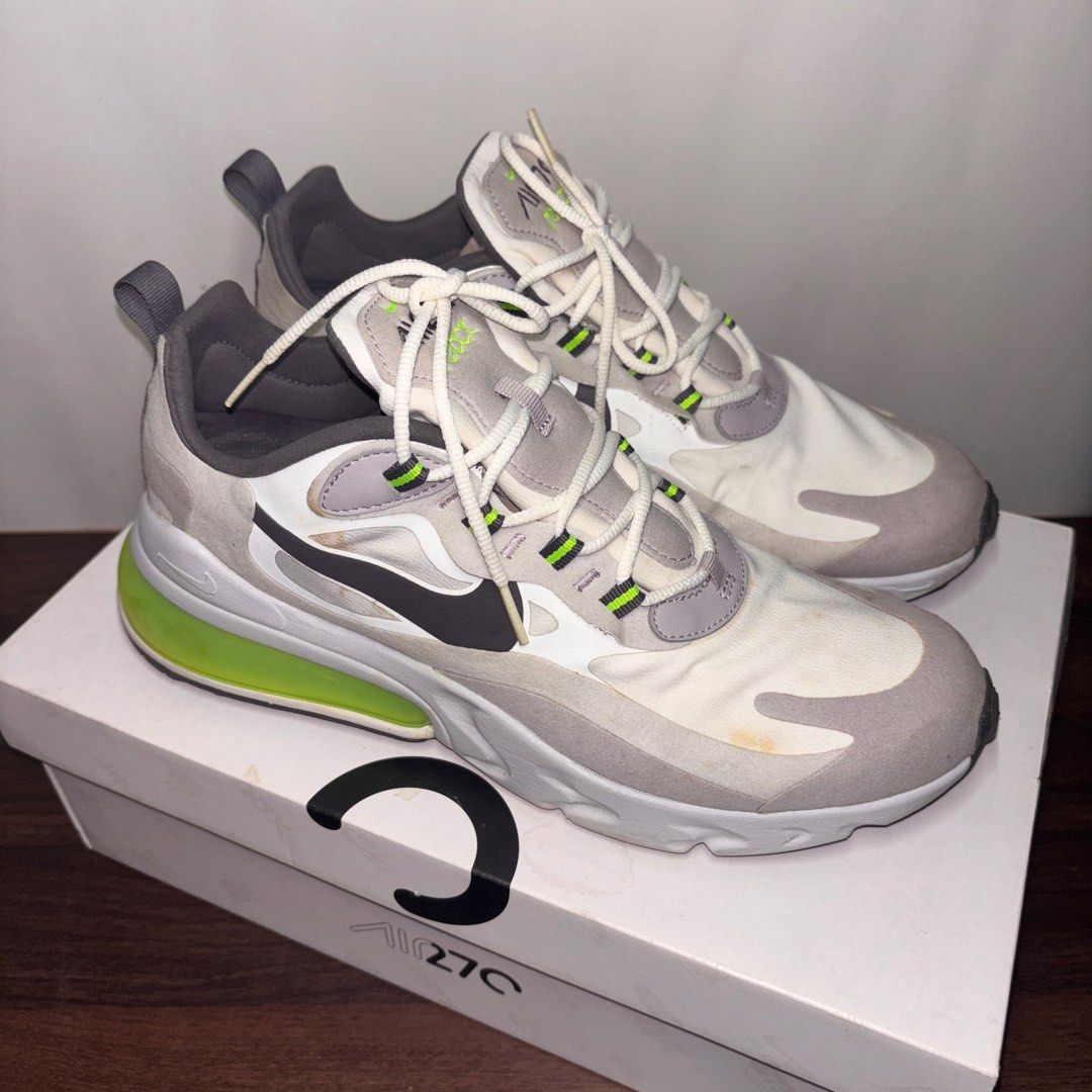 Nike Air Max 270 React (Category: Sneakers) located in Las Pinas. Submitted by mariajuliacq (Listing ID 1408210231, Image 2). Description: - Nike Air Max 270 React sneakers - Size: US 10 - Colorway: White, Grey, Neon Green - Includes original box - Condition: Slight sole separation and discoloration/yellowing - Made in Vietnam.