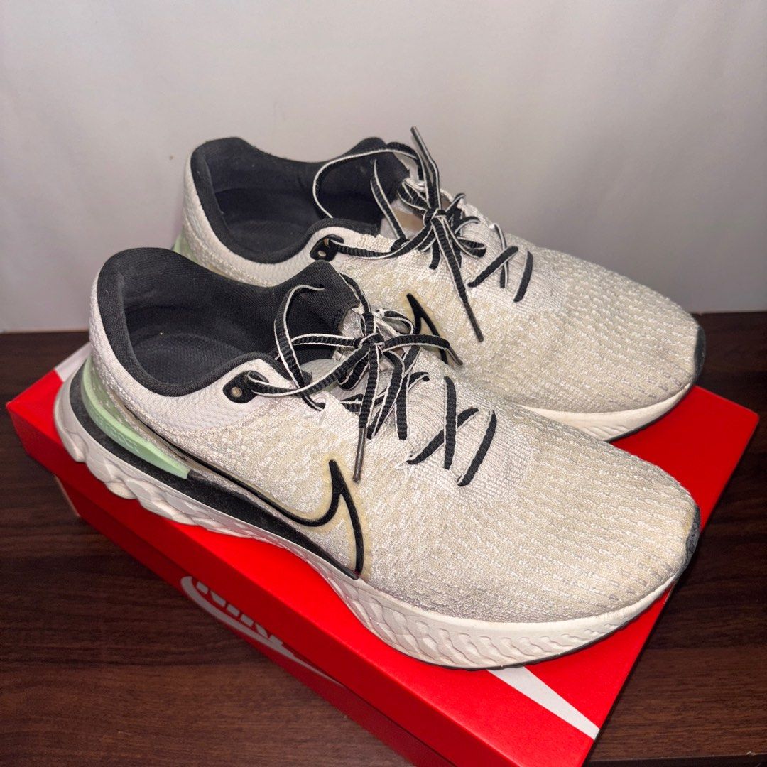 Nike React Infinity Run FK3 (Category: Sneakers) located in Las Pinas. Submitted by mariajuliacq (Listing ID 1408209667, Image 2). Description: - Nike React Infinity Run FK3 sneakers - Size: US 10.5 - Colorway: White and Black - Includes original box - Condition: Slight discoloration - Original Price: ₱5,300.00.