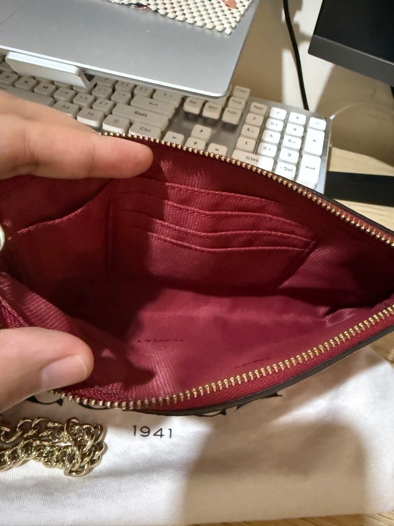 Original Coach Sling Wallet (Category: Luxury Bags & Wallets) located in Rizal. Submitted by tinsssjmgd (Listing ID 1408130157, Image 3). Description: - Preloved - Very good condition - With dustbag Payment 1st Shipping fee c/o buyer.
