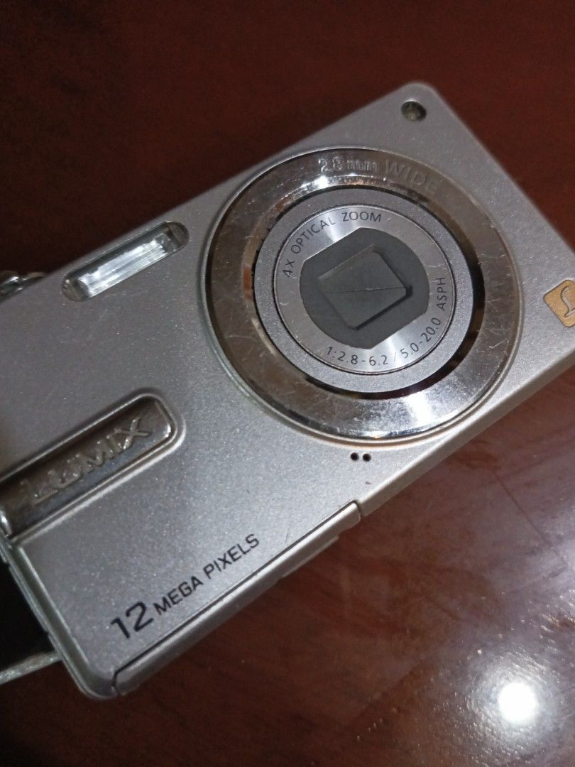 Panasonic Lumix DMC-F3 Digital Camera (Category: Cameras) located in Tuguegarao City. Submitted by yeonlim (Listing ID 1408290757, Image 2). Description: - Panasonic Lumix DMC-F3 digital camera LENS - 12 Megapixels - 4x Optical Zoom - 28mm Wide Lens - Silver body The mother board is broken but the lens itself is perfectly working .