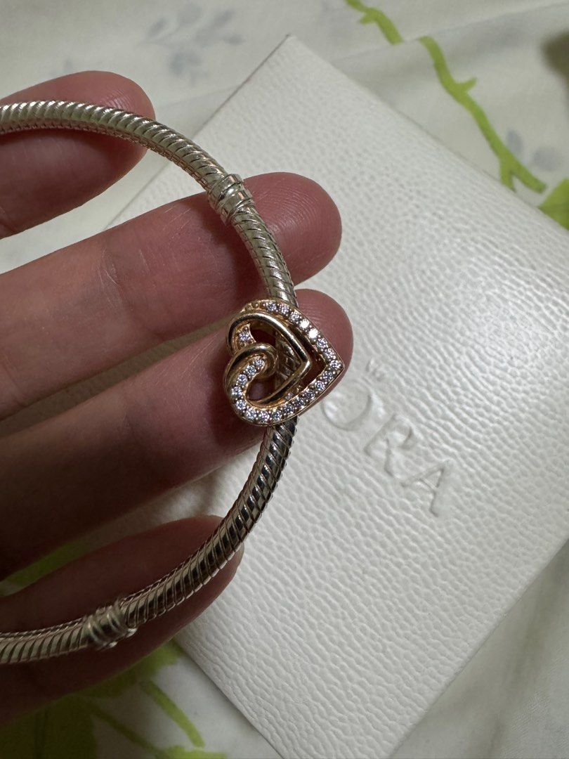 Pandora Bracelet with Heart Charms (Category: Bracelets) located in Pasay City. Submitted by mscaoo (Listing ID 1408244030, Image 2). Description: Pandora Bracelet Heart ORIGINAL *look for specific hallmarks like S925 ALE (or just ALE, S925 before 2011)* bracelet 3,000 Charm from 850 to 600 PS. No box RFS. This is my second bracelet. Net to let go na :) Thank you .
