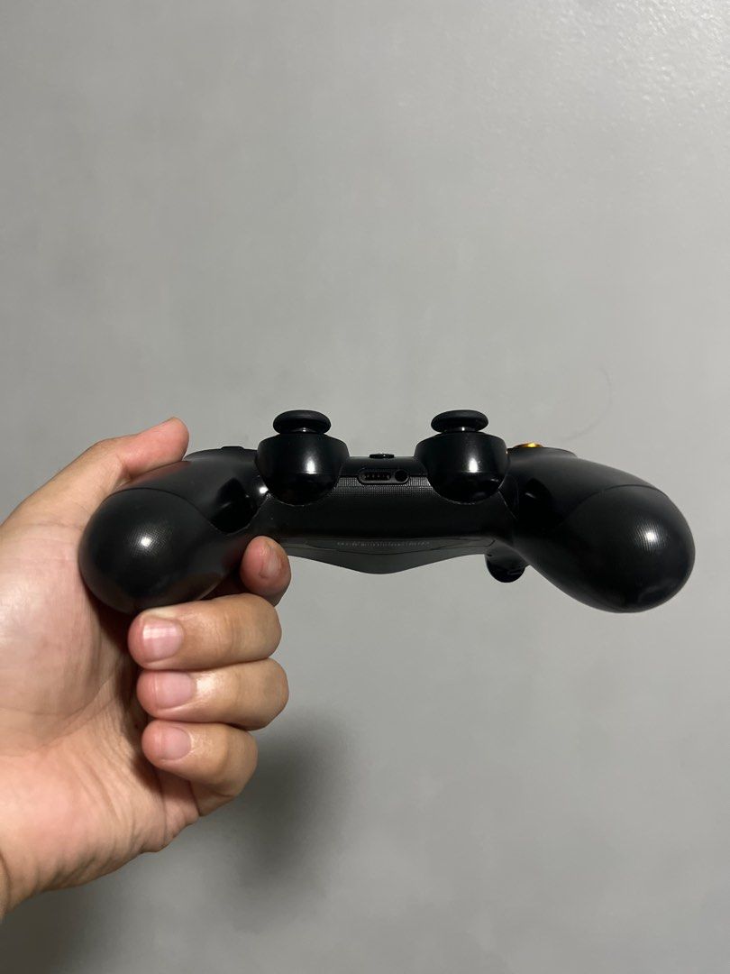 PlayStation 4 Controller (Category: Controllers) located in Quezon City. Submitted by _kpiph (Listing ID 1408269560, Image 2). Description: PS4 Controller • Condition: 8.5/10 • Scratches due to wear and tear • Customized analog buttons • RFS: Spare controller; not used anymore.