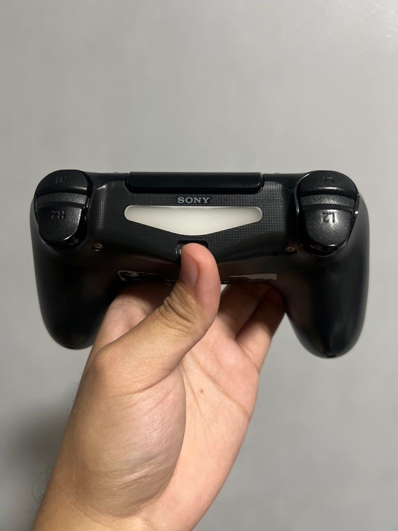 PlayStation 4 Controller (Category: Controllers) located in Quezon City. Submitted by _kpiph (Listing ID 1408269560, Image 3). Description: PS4 Controller • Condition: 8.5/10 • Scratches due to wear and tear • Customized analog buttons • RFS: Spare controller; not used anymore.