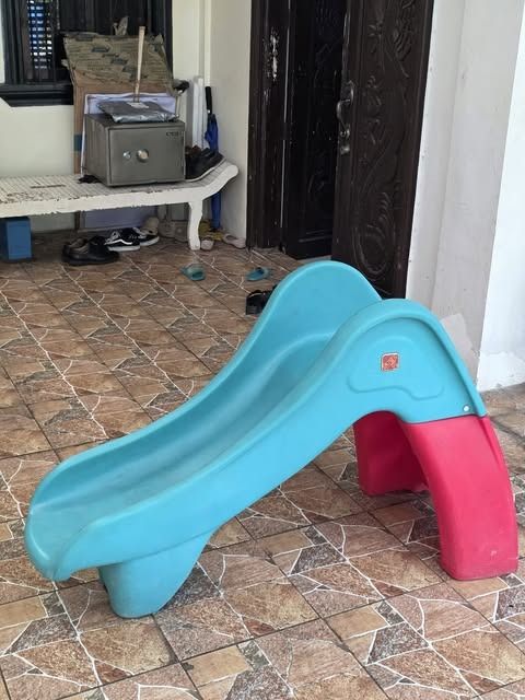 Step2 Toddler Slide - Teal & Red (Category: Infant Playtime) located in Manila. Submitted by trendsettershoppe (Listing ID 1408297463, Image 2). Description: Step2 Toddler Slide - Teal & Red ​Description: -Selling a durable Step2 slide in good used condition. -Perfect for toddlers to burn off energy indoors or outdoors! -​Safe Design: Features high side rails and easy-to-climb steps for little ones. ​ ​Condition: Structurally sound with normal si